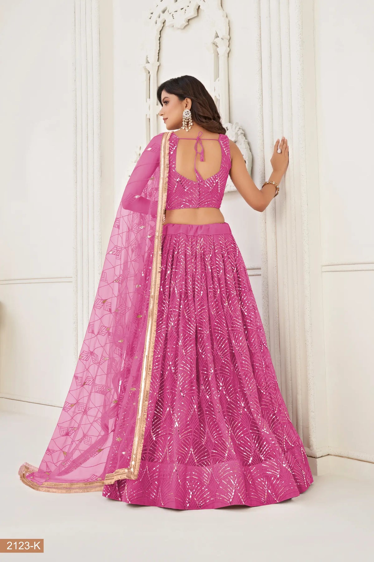 Fuchsia Pink Net Embroidery Lehenga Choli