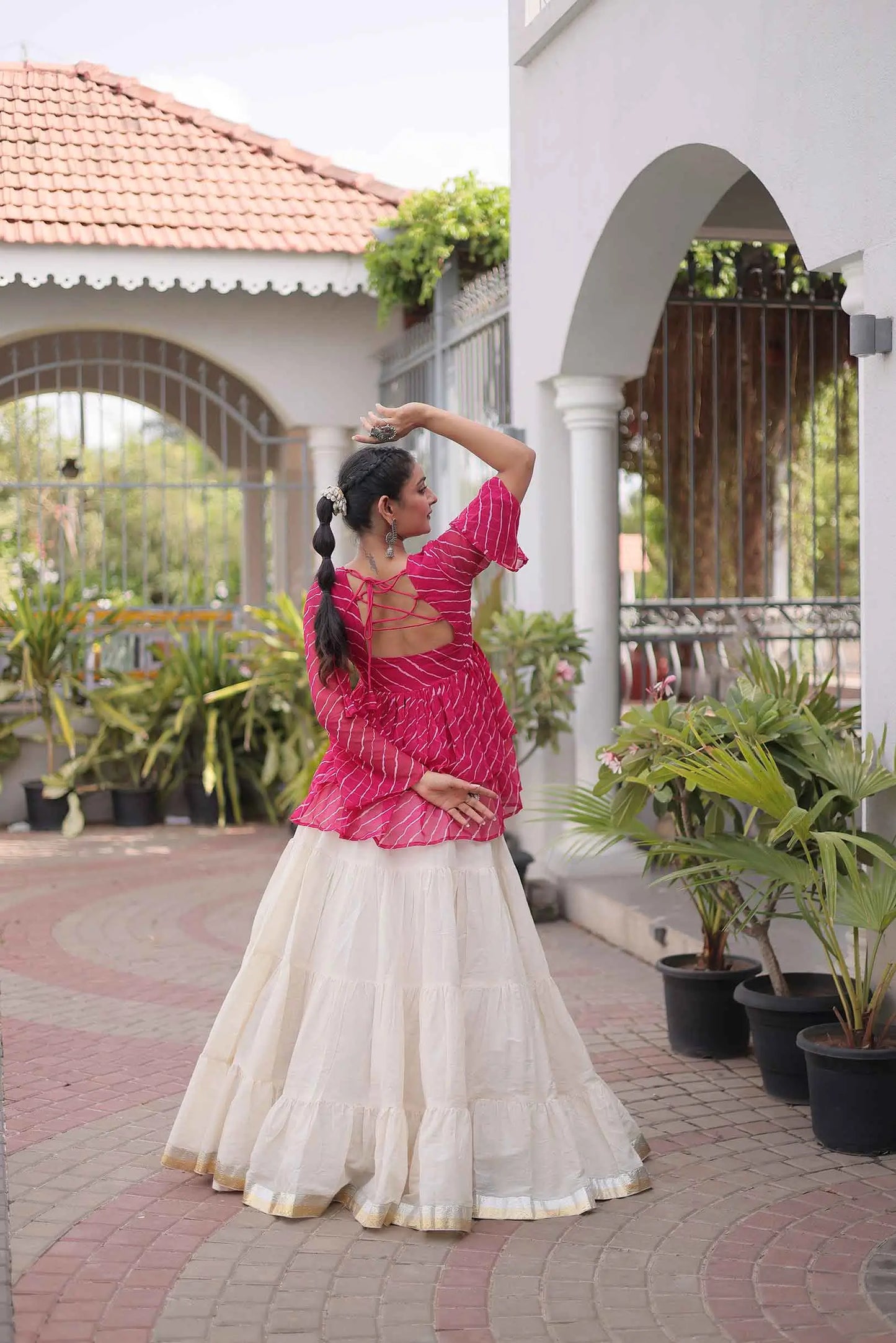 Pink Peplum Style Blouse And Lehenga