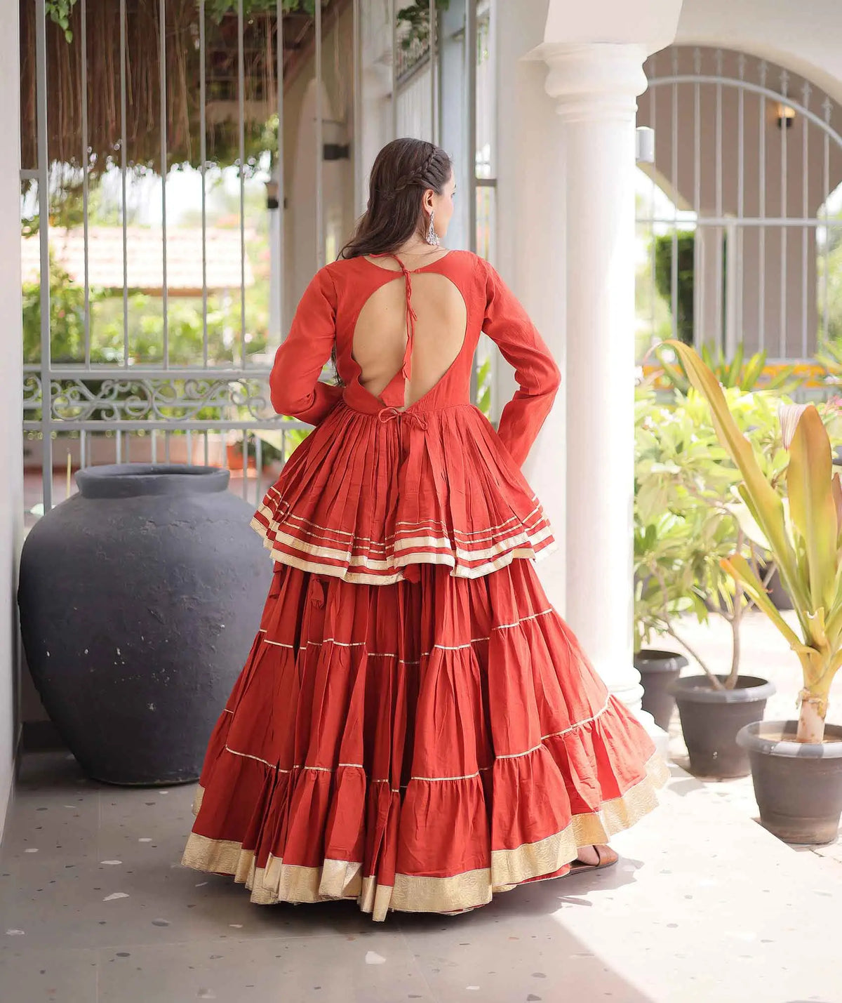 Rust Lehenga With Peplum Style Blouse