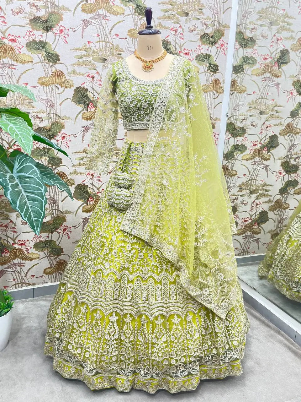 Light Olive Green Shining Thread Embroidery Design Net Lehenga Choli