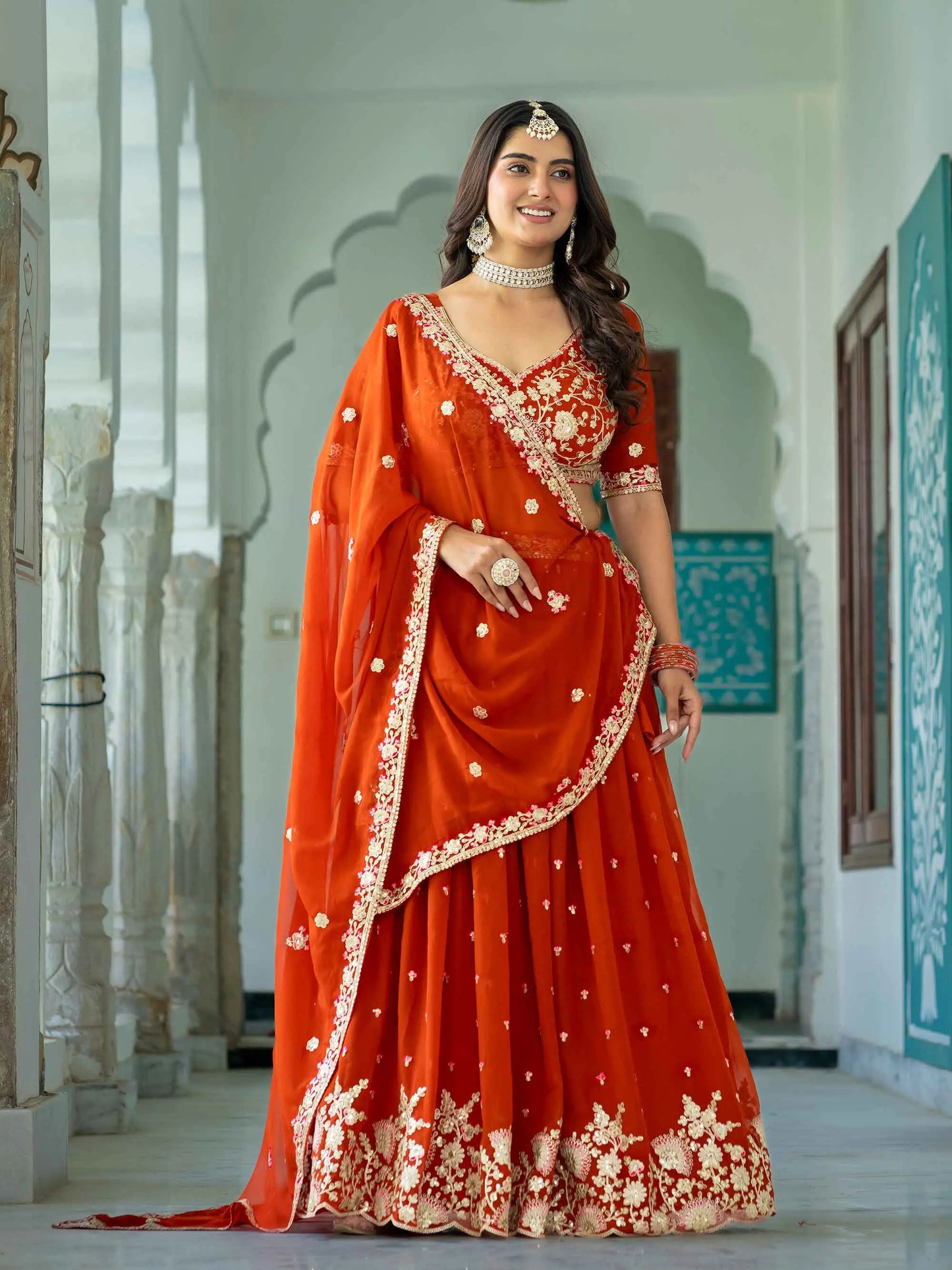 Rust Embroidered Georgette Lehenga Choli