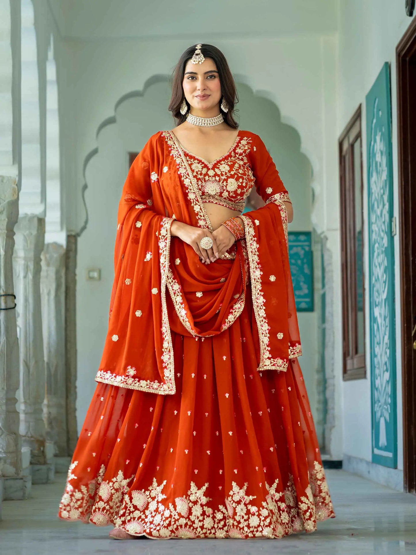 Rust Embroidered Georgette Lehenga Choli