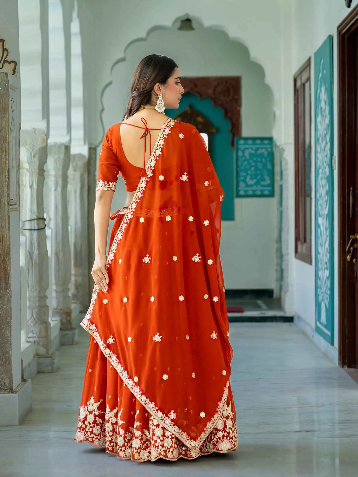Rust Embroidered Georgette Lehenga Choli