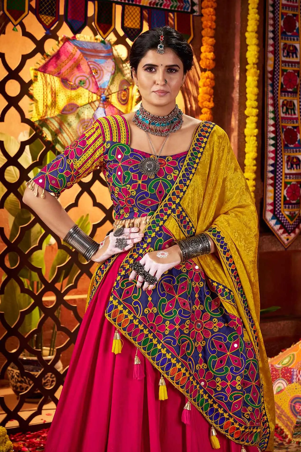 Pinkish Red And Yellow Thread Embroidery And Mirror Work Navratri Lehenga