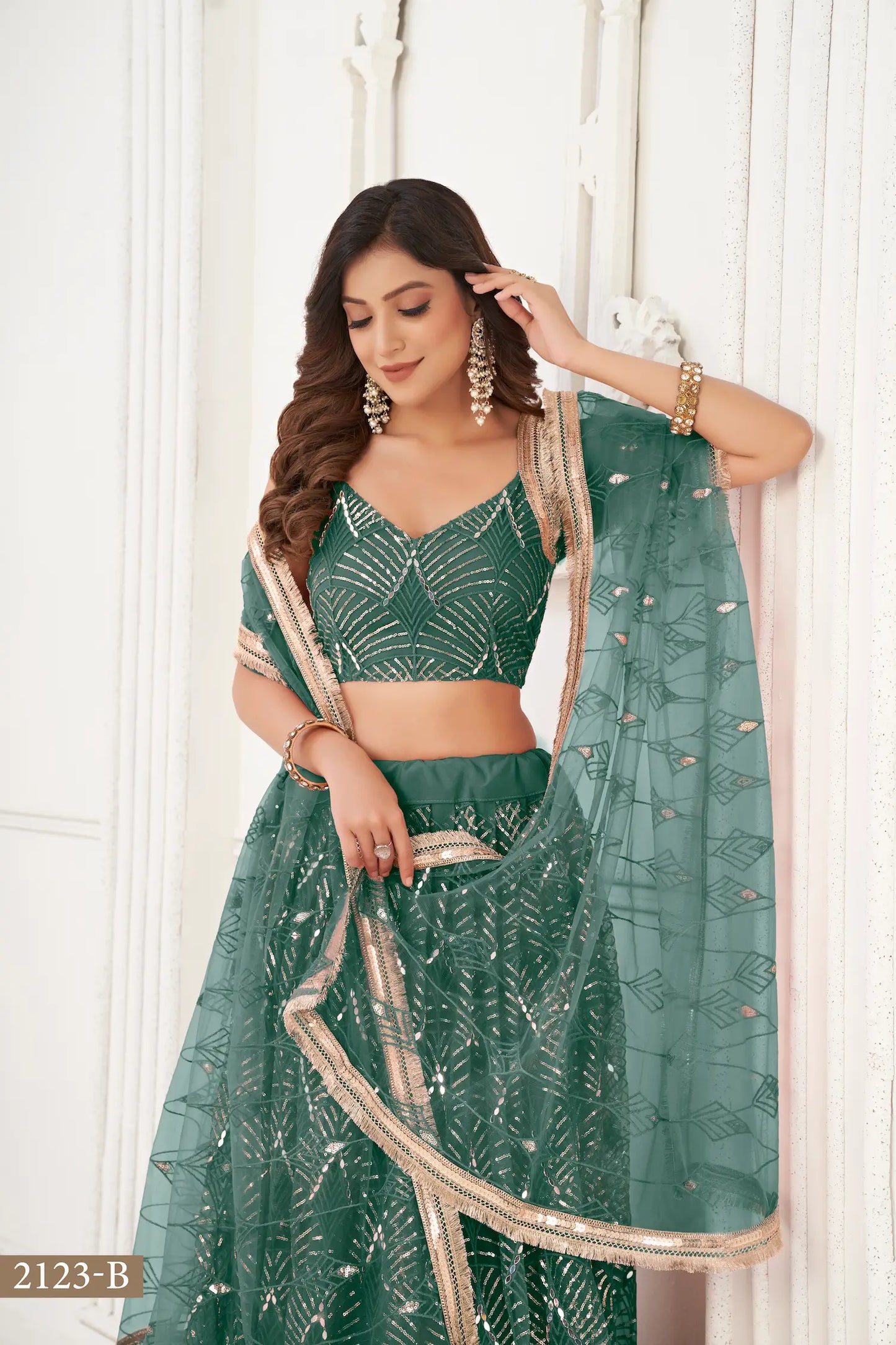 Bottle Green Net Embroidery Lehenga Choli