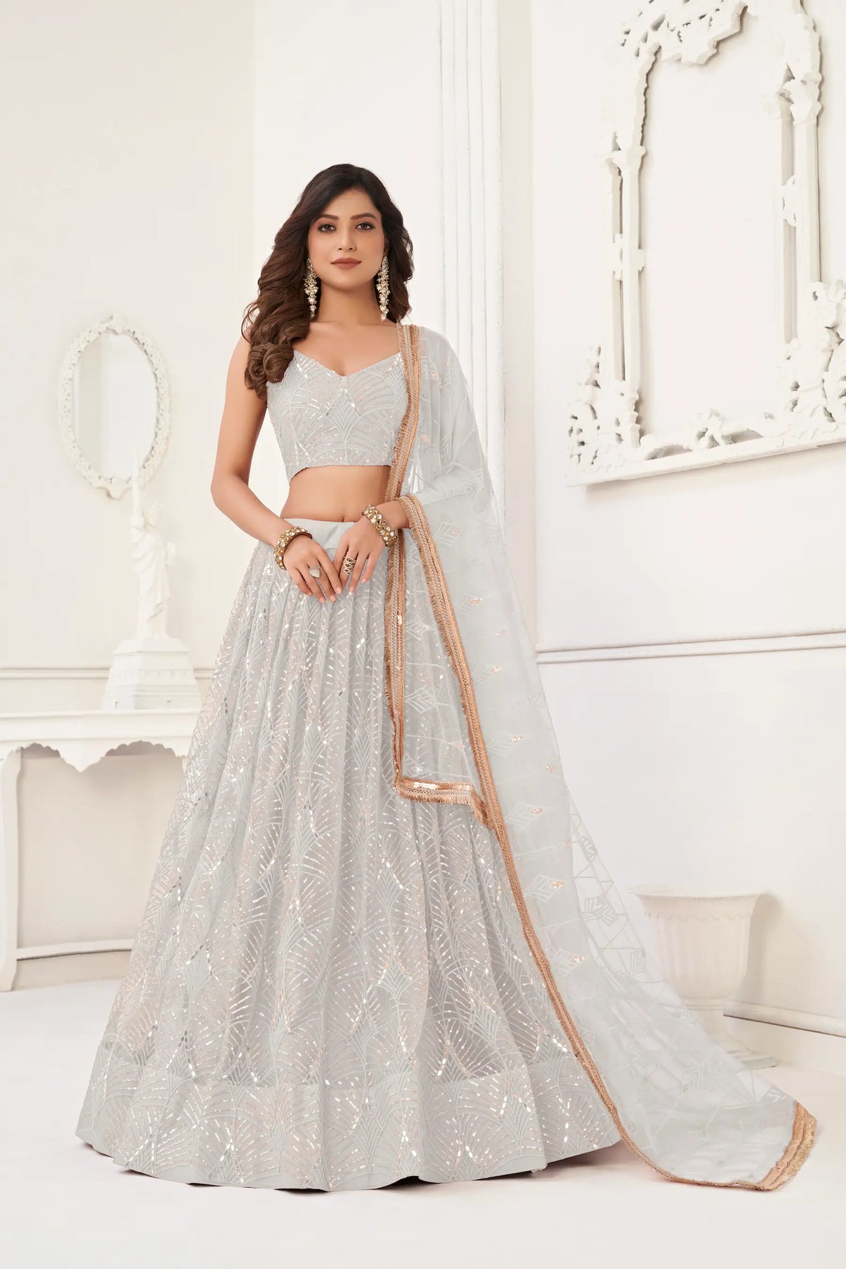 Off White Net Embroidery Lehenga Choli