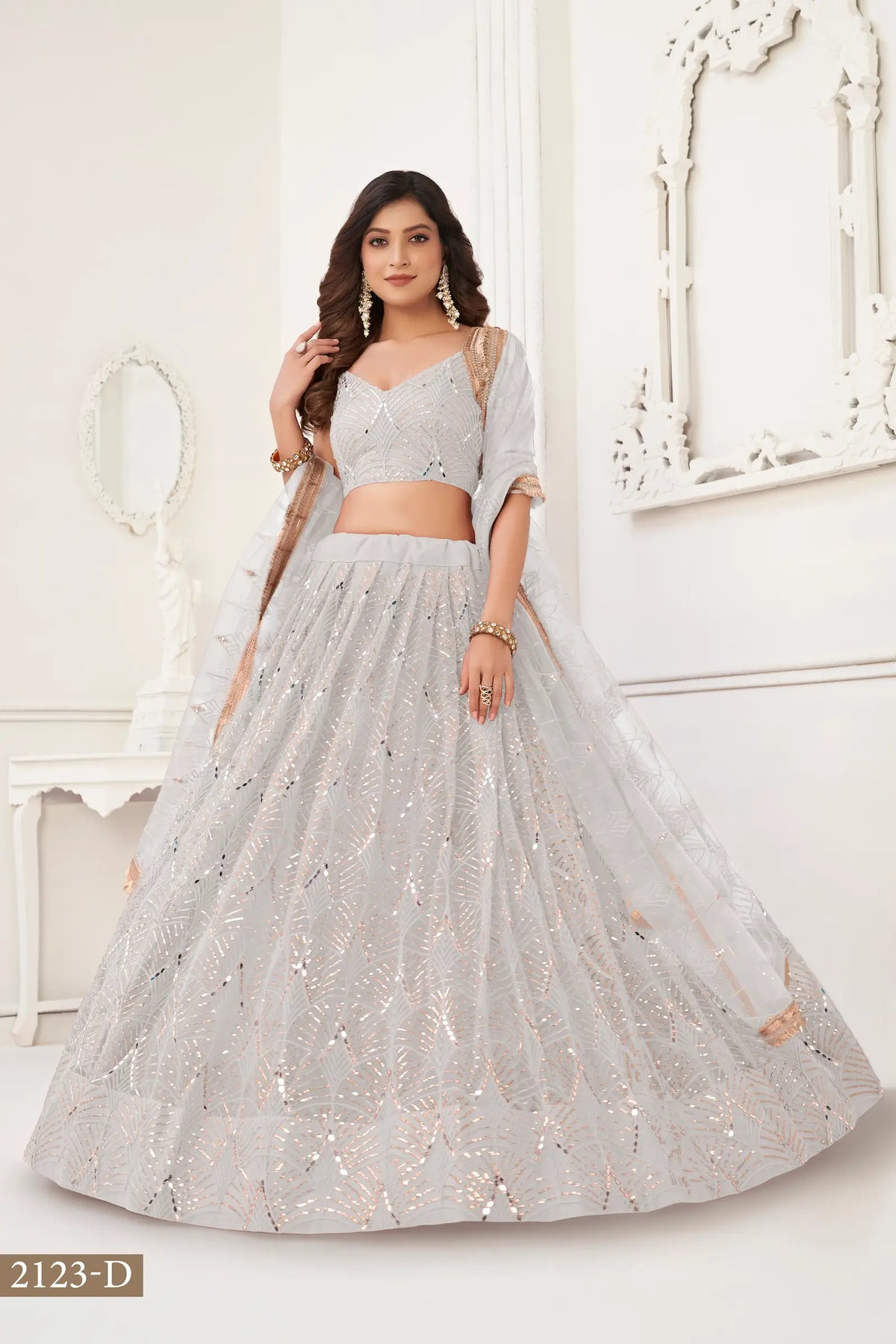 Off White Net Embroidery Lehenga Choli
