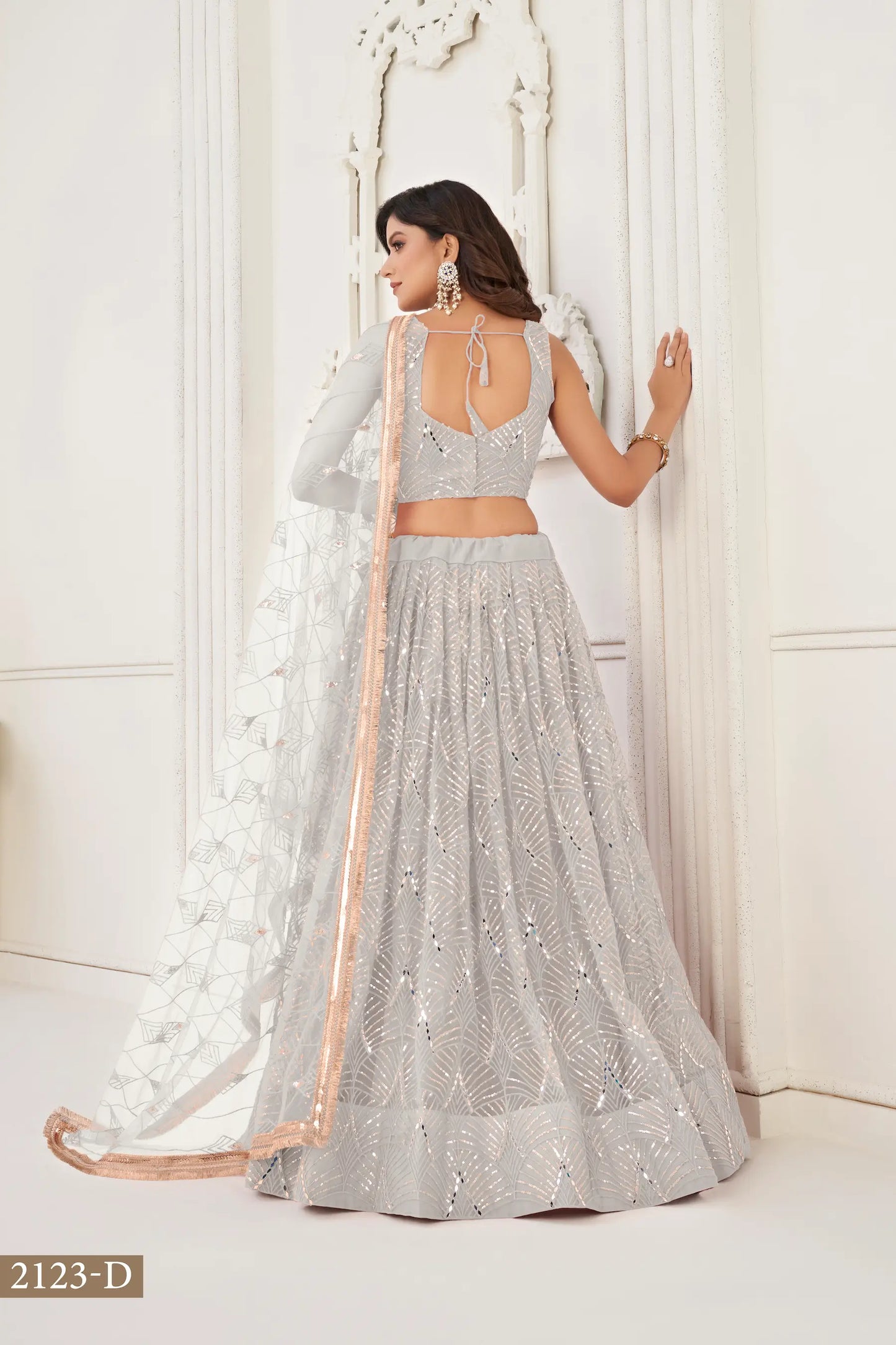 Off White Net Embroidery Lehenga Choli