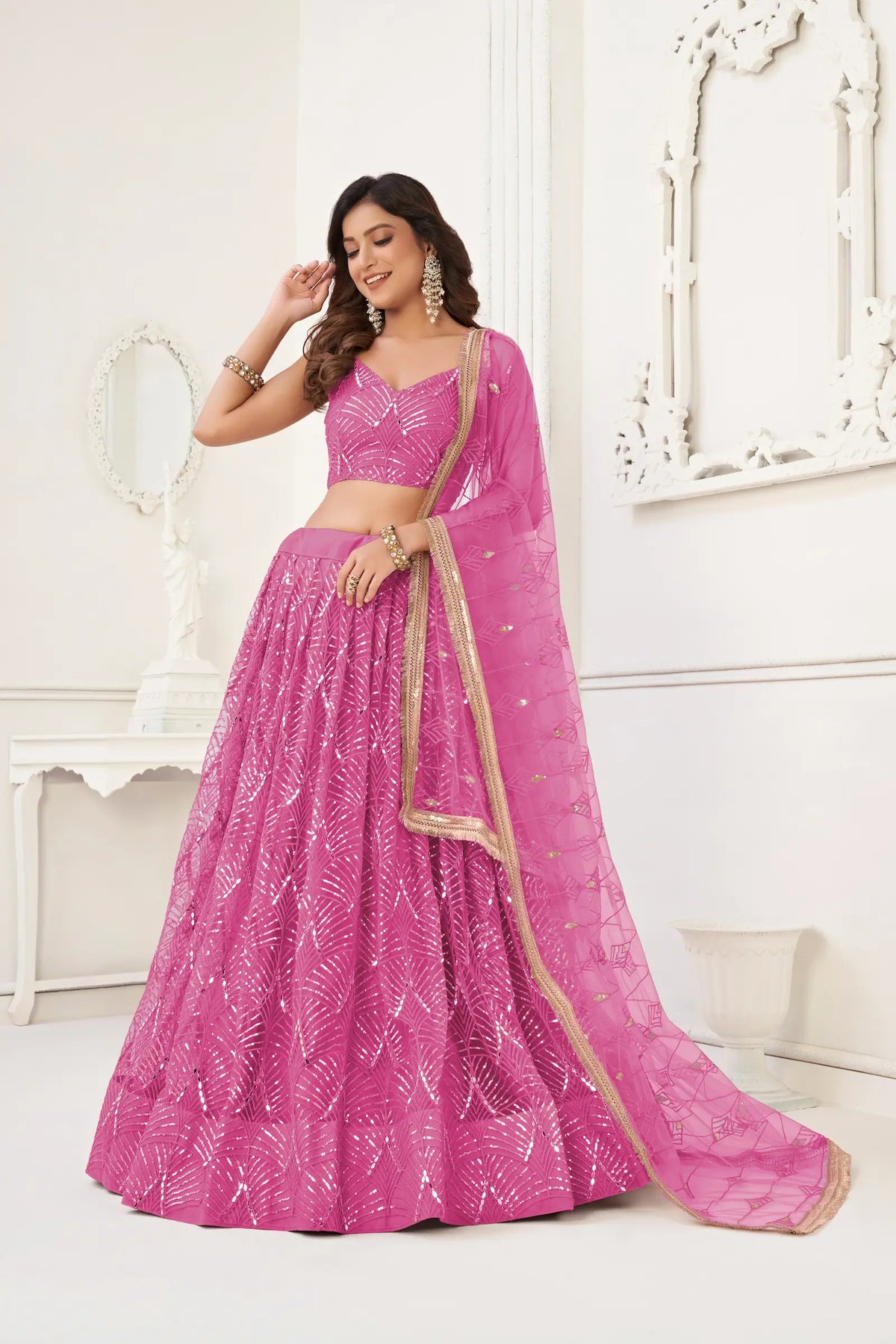 Fuchsia Pink Net Embroidery Lehenga Choli