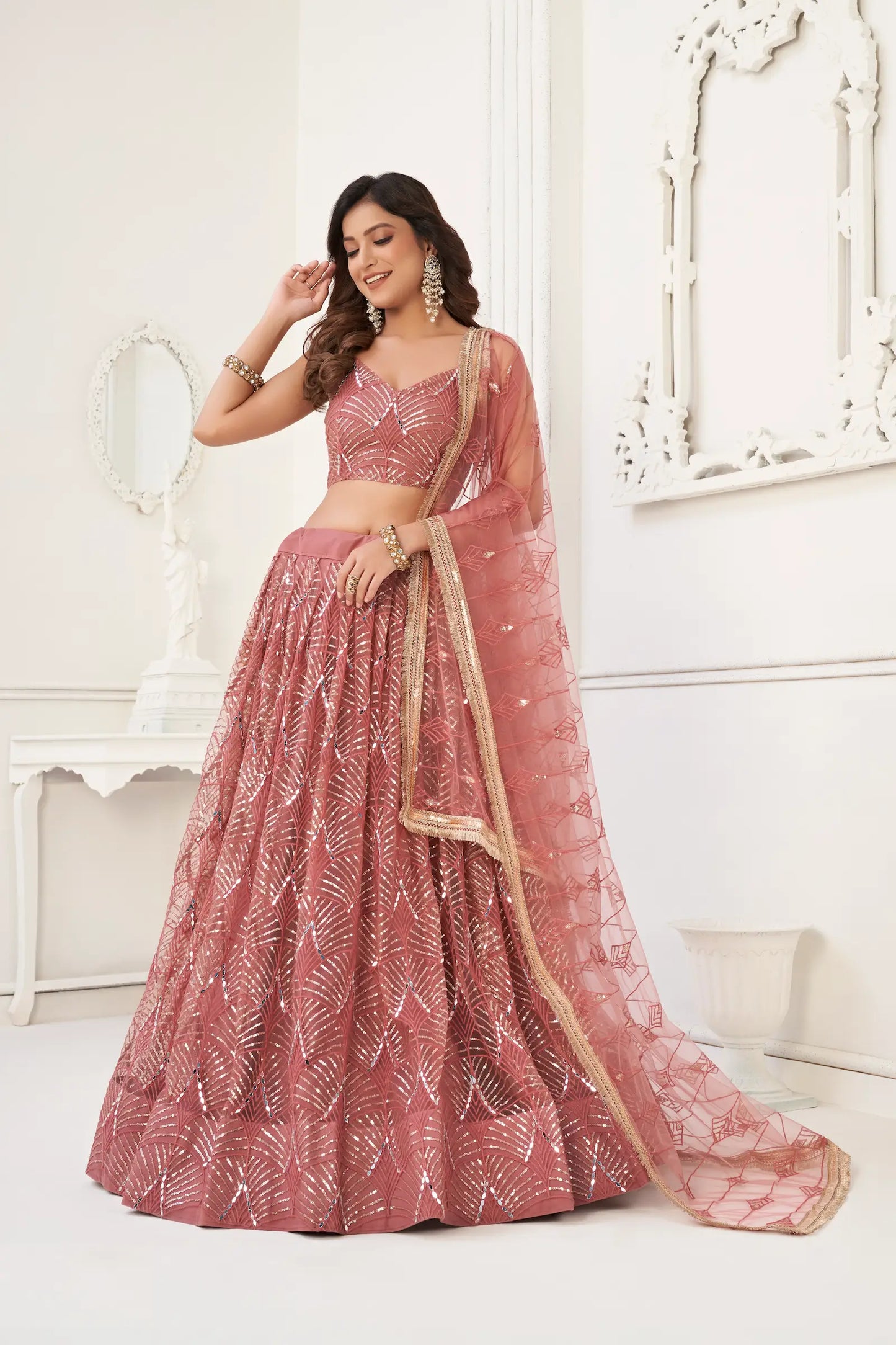 Brownish Pink Net Embroidery Lehenga Choli