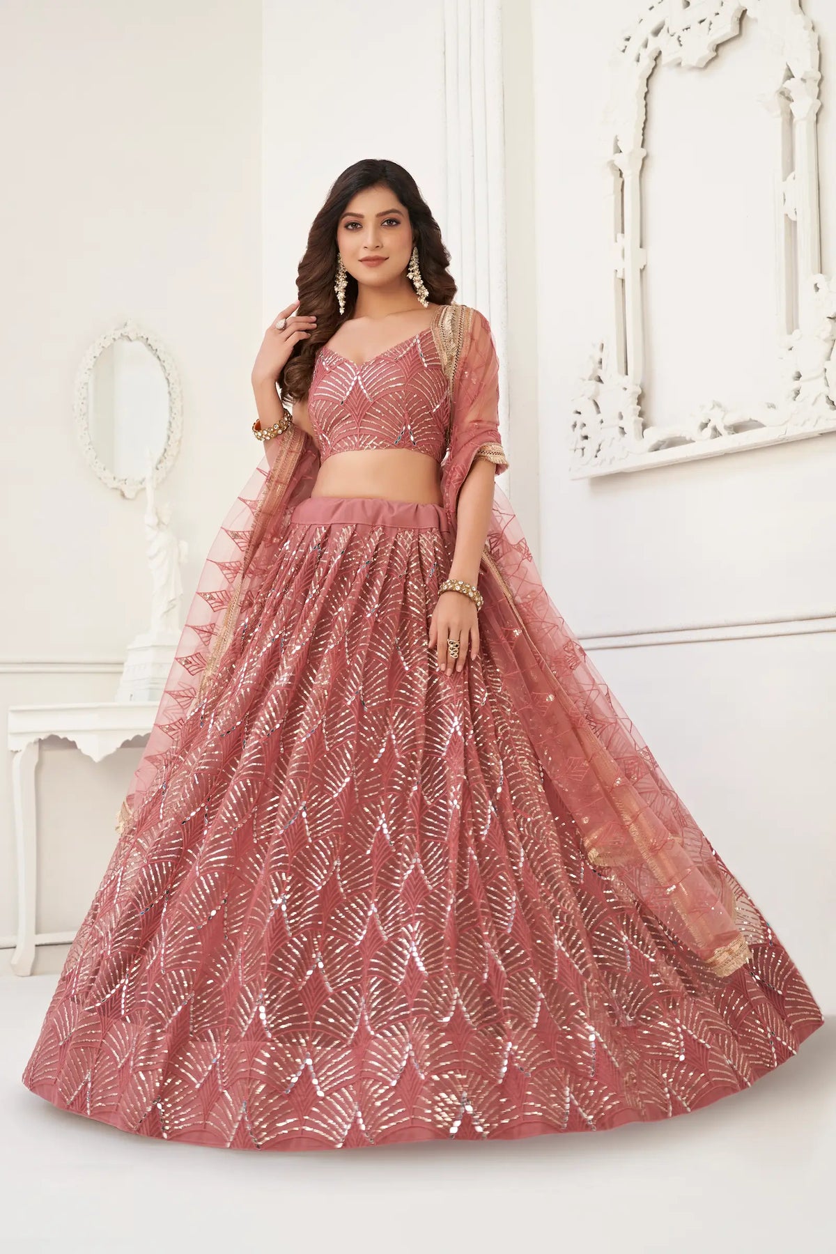 Brownish Pink Net Embroidery Lehenga Choli