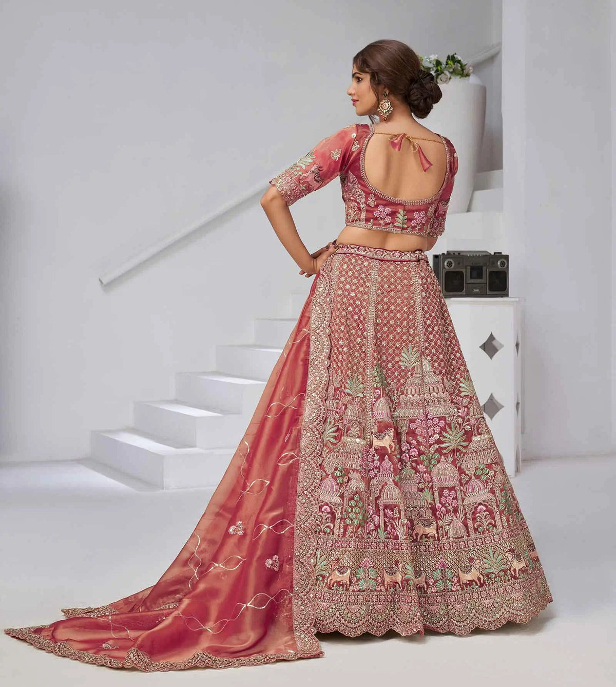 Pinkish Red Bridal Lehenga With Temple & Cow Motifs