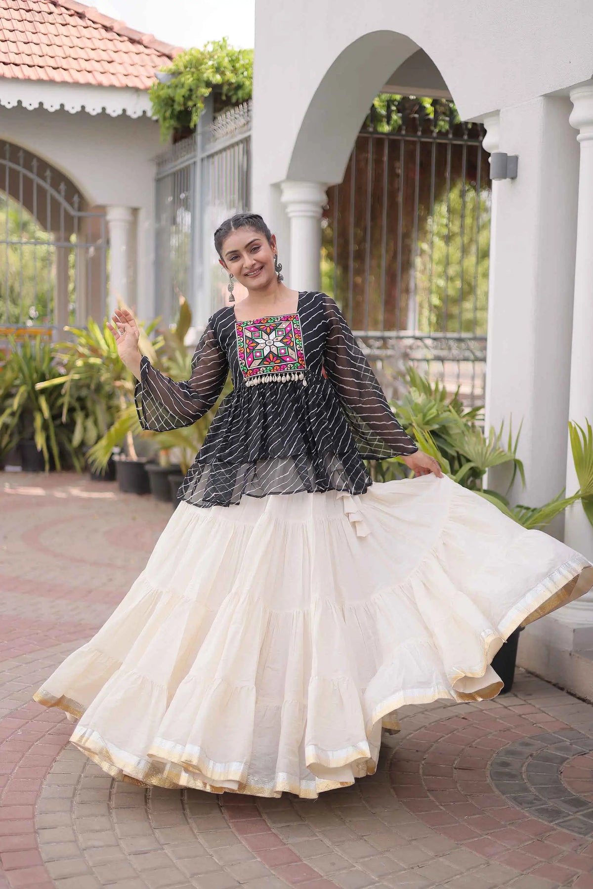 Black Peplum Style Blouse And Lehenga