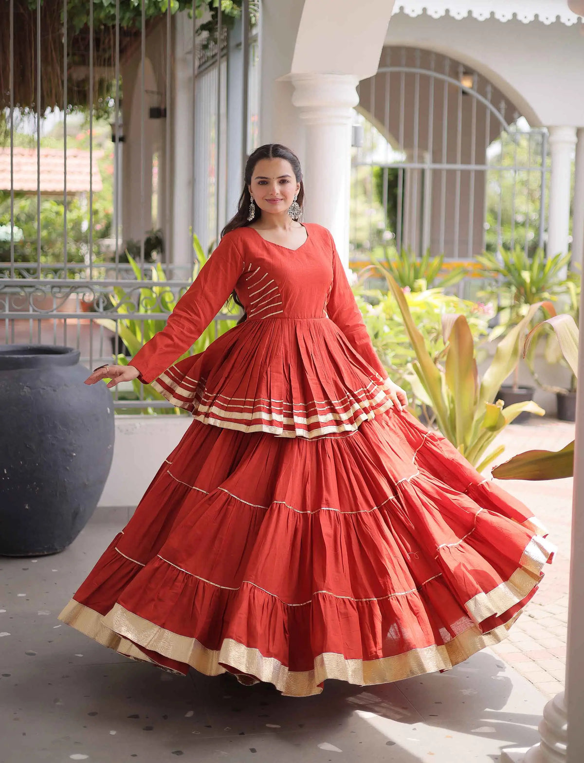 Rust Lehenga With Peplum Style Blouse