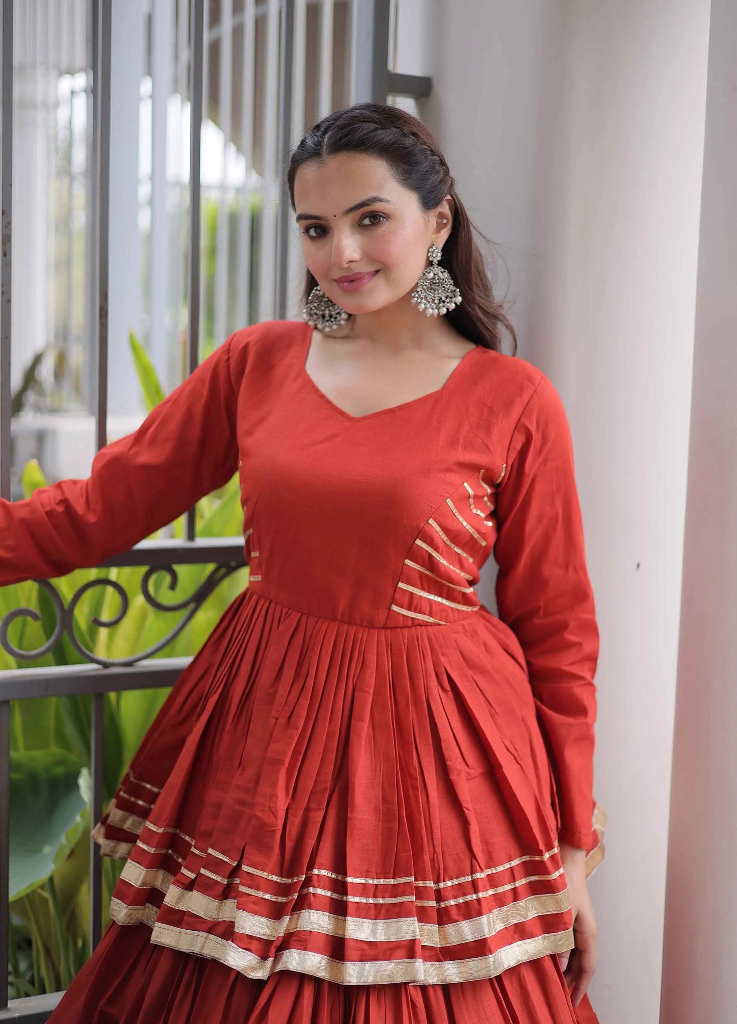 Rust Lehenga With Peplum Style Blouse
