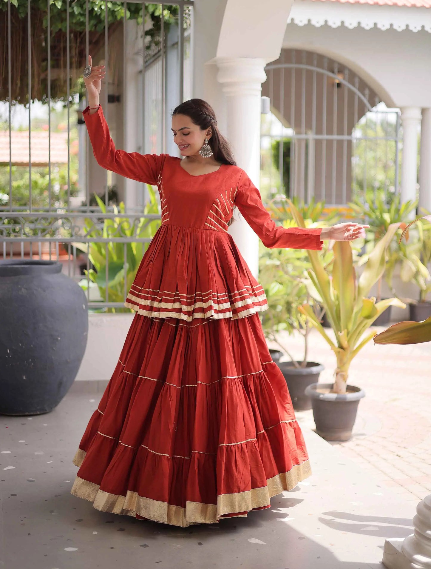 Rust Lehenga With Peplum Style Blouse