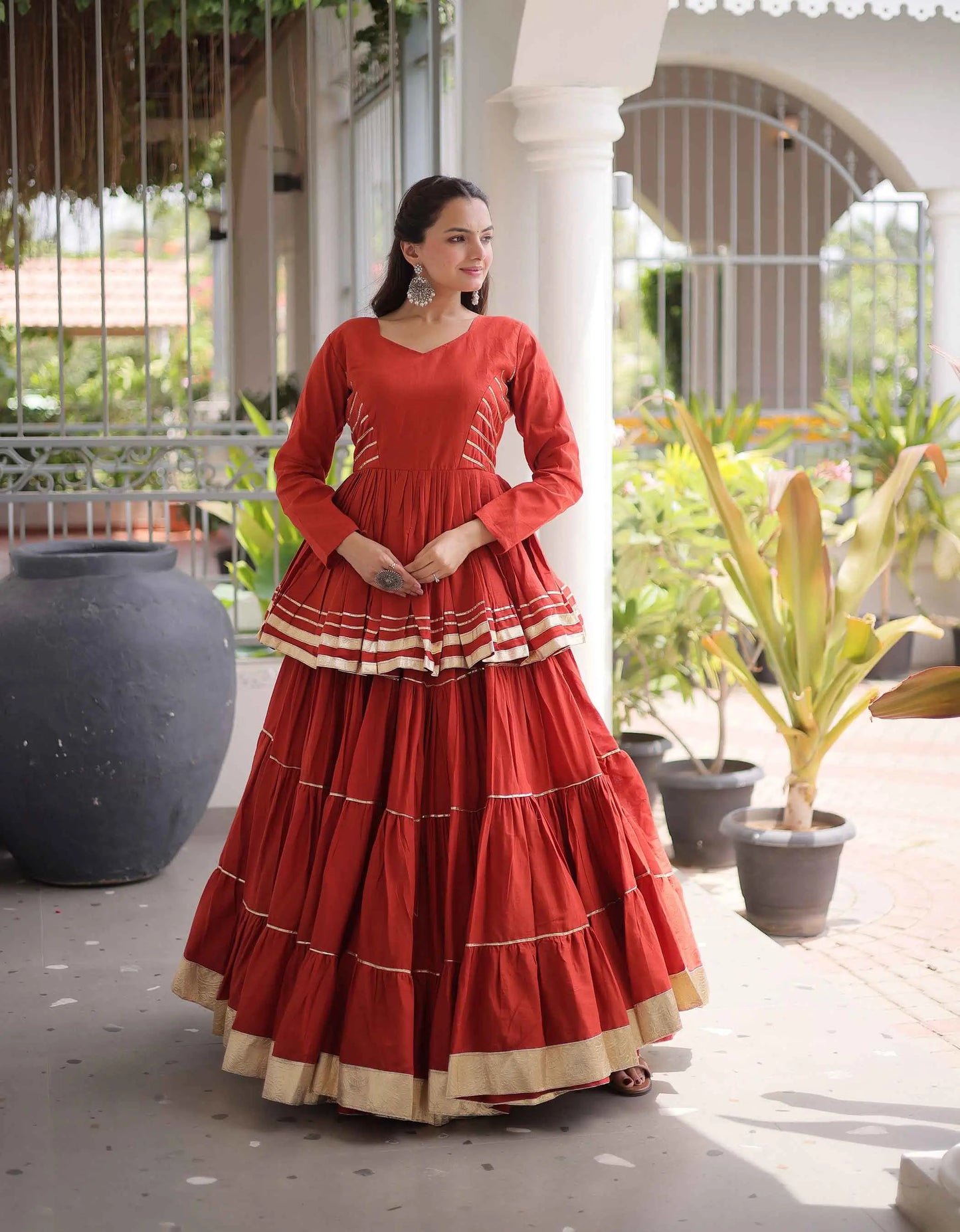Rust Lehenga With Peplum Style Blouse