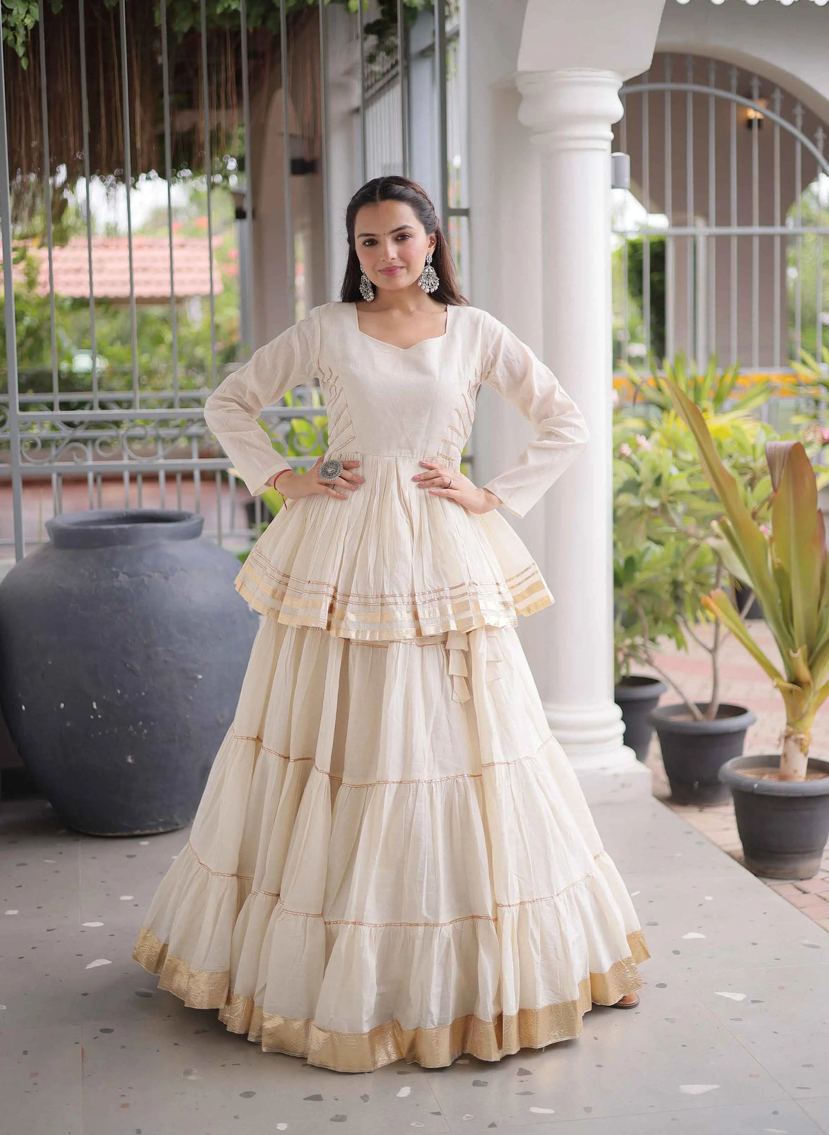 White Lehenga With Peplum Style Blouse