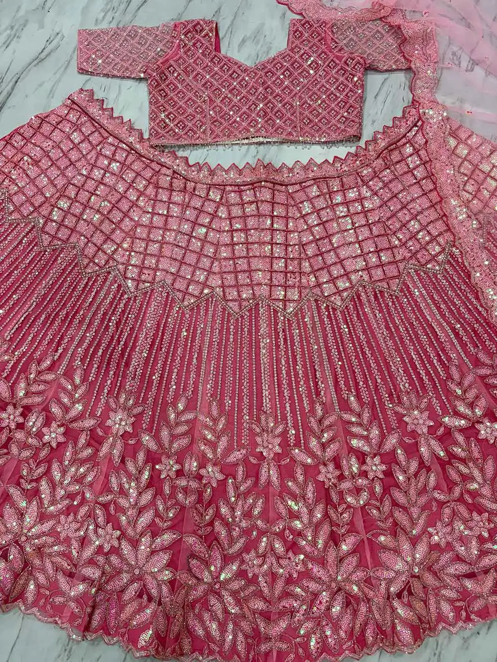 Peach Pink Rainbow Sequins Dori Embroidery Work Net Lehenga Choli