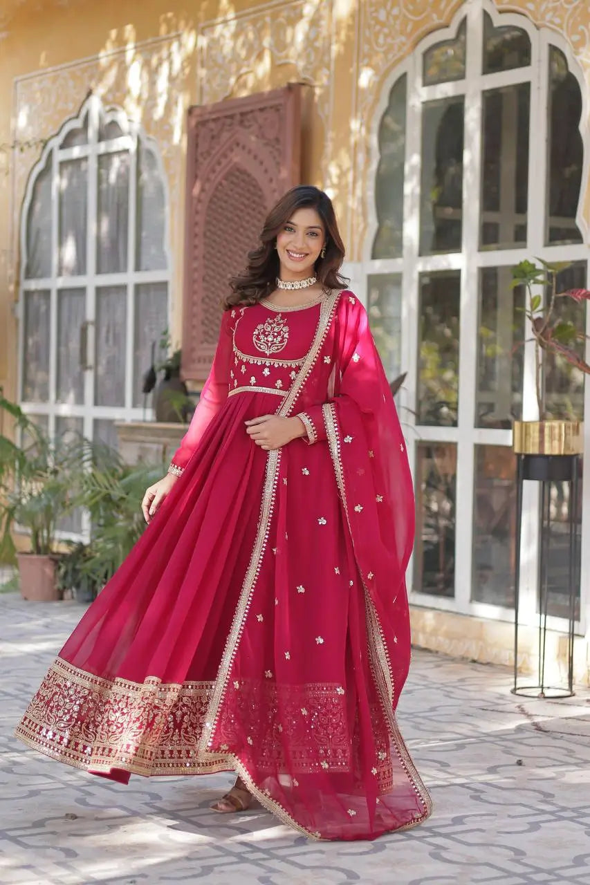 Carmine Red Faux Georgette Gown With Rich Sequins Embroidery Work
