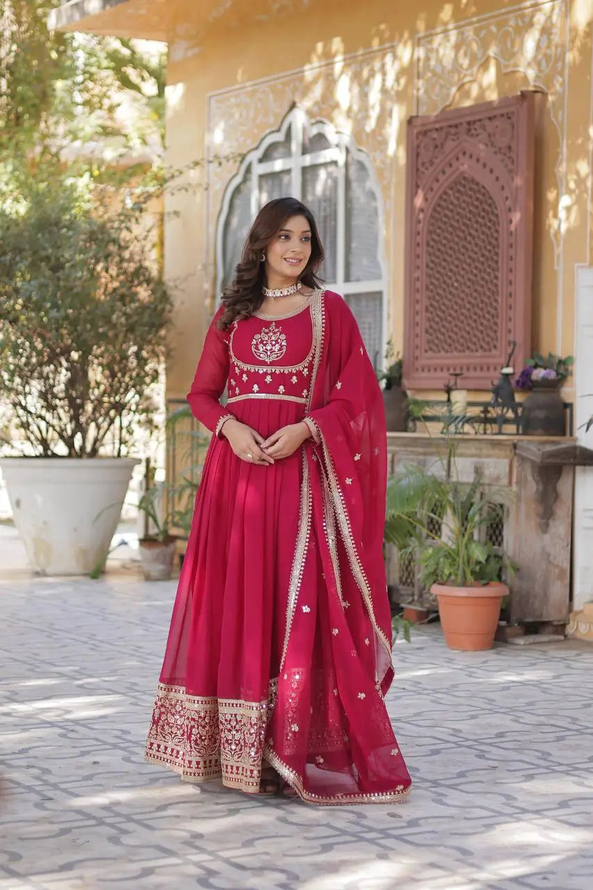 Carmine Red Faux Georgette Gown With Rich Sequins Embroidery Work
