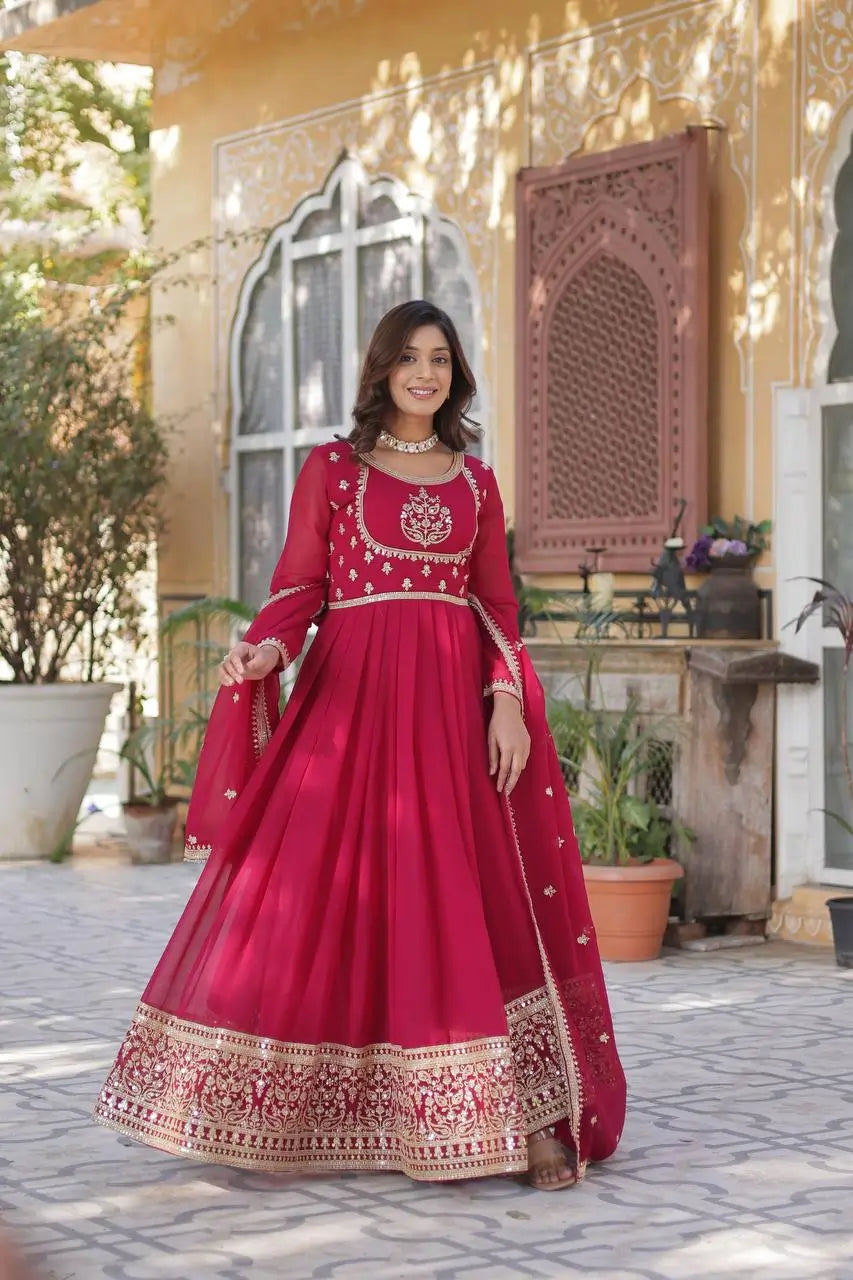 Carmine Red Faux Georgette Gown With Rich Sequins Embroidery Work