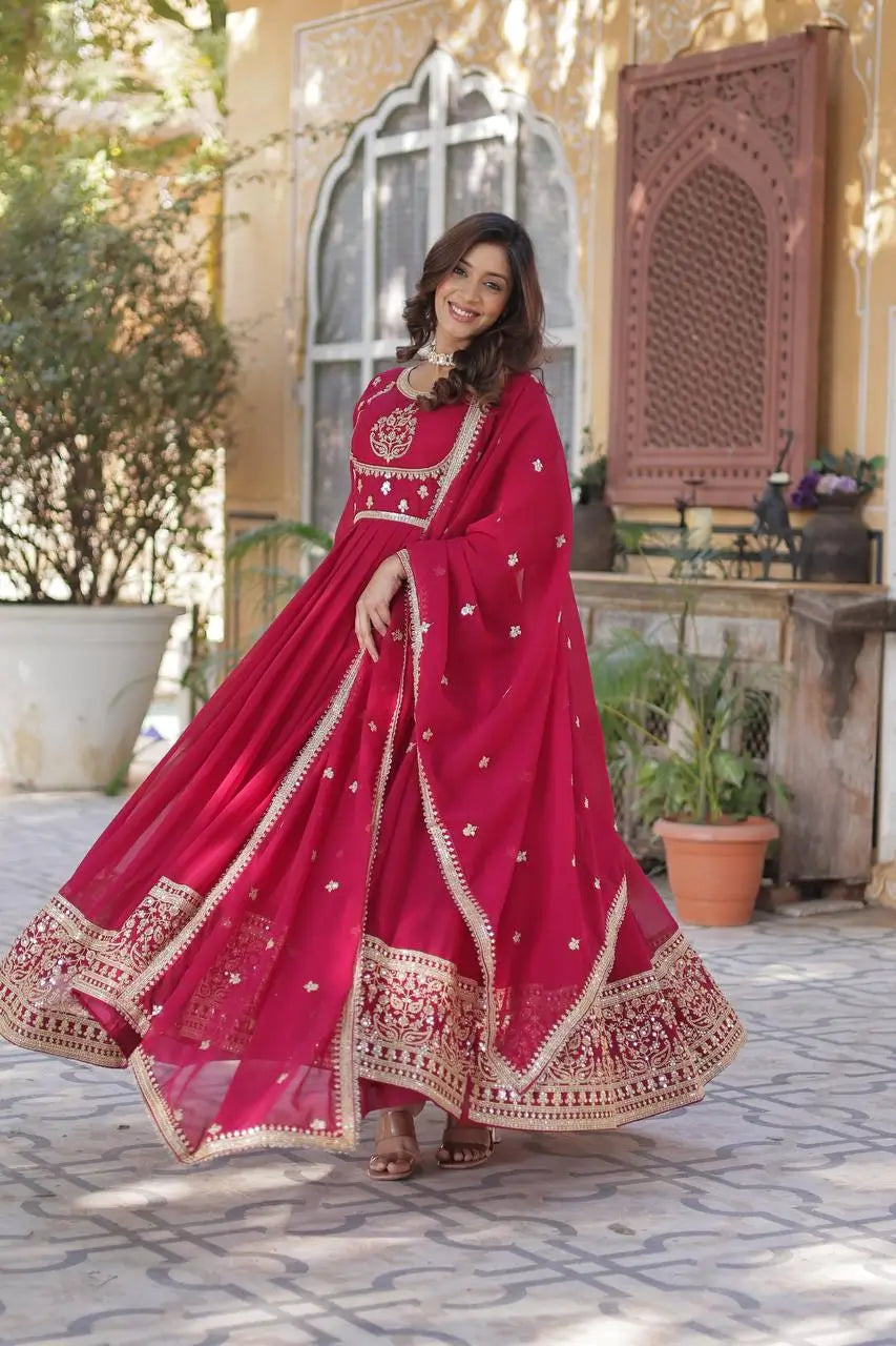 Carmine Red Faux Georgette Gown With Rich Sequins Embroidery Work